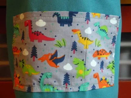 Tablier 6 ans DINOSAURES vert menthe 2 atelier-béarnais